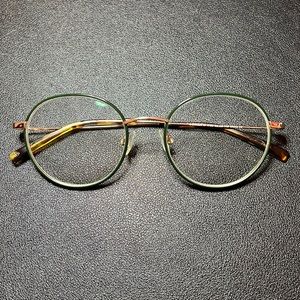 Used Warby Parker Duncan Wide frames in forest green with polish gold